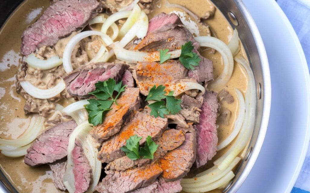 Rich and creamy Beef Stroganoff Without Mushrooms served over egg noodles